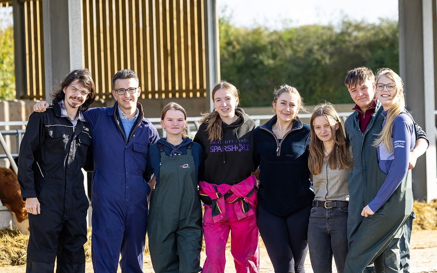 Agriculture Students joining arms on the farm at University centre Sparsholt