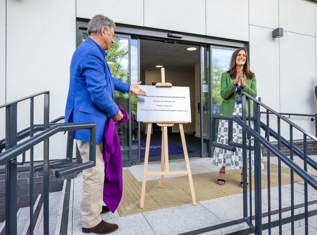 Alan Titchmarsh unveiling plaque at the entrance of the University Centre Sparsholt Research and Science Centre during the official opening ceremony